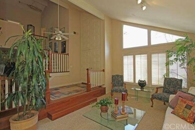 Elegant entry with ceiling fan.