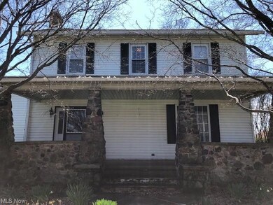 front open porch has natural stone