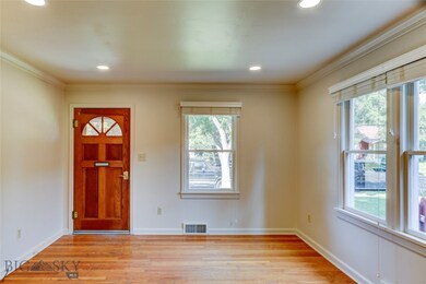 Front door into your pretty living room