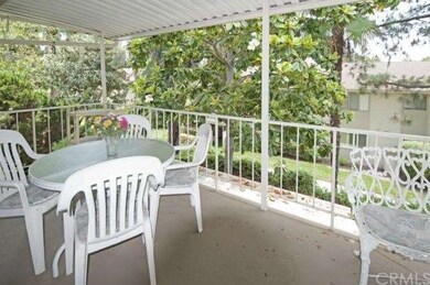 LARGE BALCONY SURROUNDED BY GLORIOUS FLOWERING MAG