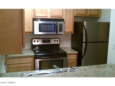Kitchen w/ granite countertops