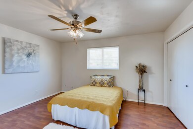 Master bedroom is fresh and neutral