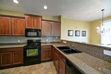 Kitchen w/Granite & Tile Backsplash