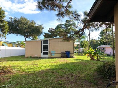 5990 Wisconsin St, Bokeelia, FL 33922 - photo 5