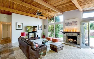 Two fireplaces for those chilly evenings, one insi