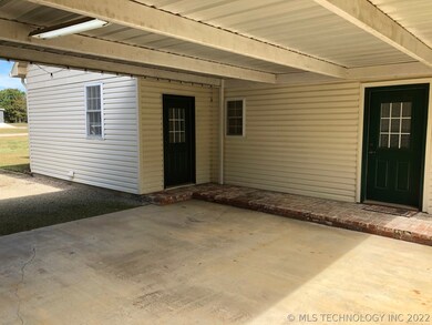 BREEZEWAY  AND ENTRANCE TO KITCHEN AND LAUNDRY ROO