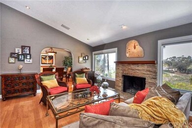 Volume ceilings and blonde wood flooring are archi
