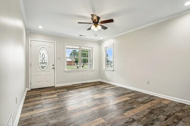 Entryway featuring dark wood-type flooring, ceilin