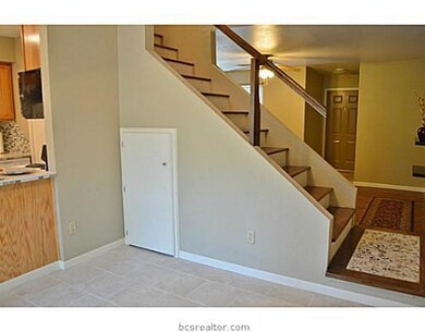 Dining Room. Stairs and Living Room