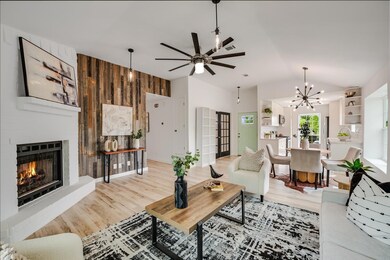 Living room with light wood finished floors, ceil