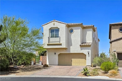 Mediterranean / spanish-style house with a garage,