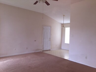 Another view of the greatroom, and dining area