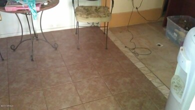Tile floor in dining room and office