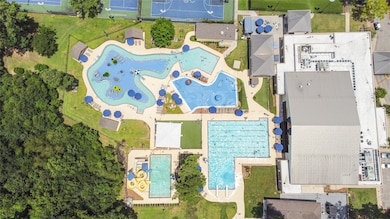Experience luxury at KWCC with an adult pool, family pool with lazy river, snack bar, and fitness center with daycare.