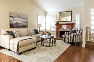 Cozy up to the fireplace and beautiful views of the front yard.  Beautiful flooring, neutral paint and plantation shutters over dual pane windows mean you can settle right in on your first day!