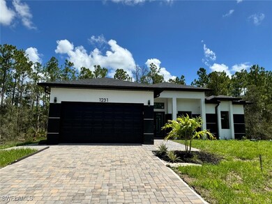 View of front of property featuring stucco siding,