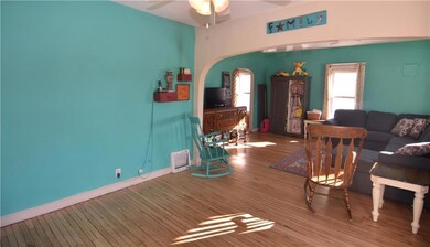 Living area with hardwood flooring