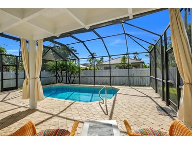 Sparkling pool with covered lanai, perfect for entertaining!
