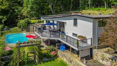 Relax on the Trex Deck or enjoy the salt water heated pool