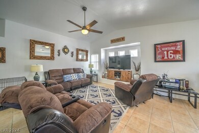 Beautiful Great Room with tiled flooring, vaulted