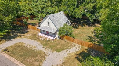 Sitting on four city Lots, Two year old roof