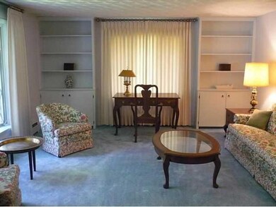 Living Room. Huge liv rm off right of foyer.Bay wi