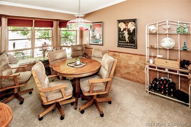 Dining area is carpeted and look at the beautiful