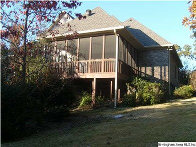 Rear of home - private backyard with backs up to f