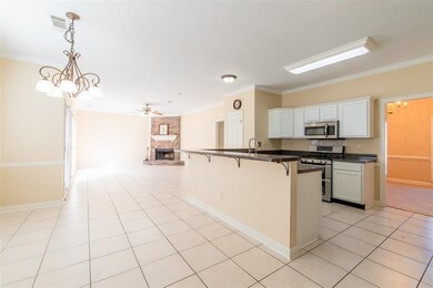 Lots of great counter space and SO many cabinets