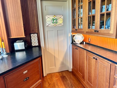 Enclosed pantry for storage.