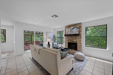 Living room featuring light tile patterned floori