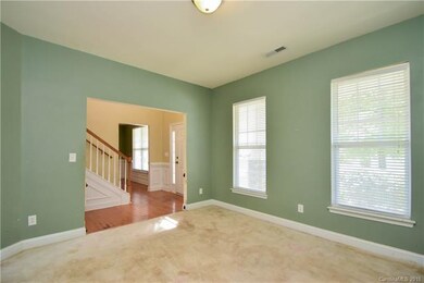 Room off of foyer could be used as an office, play