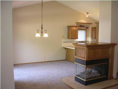 Dining Area w/ 3 Way Fireplace in Dining & Living 