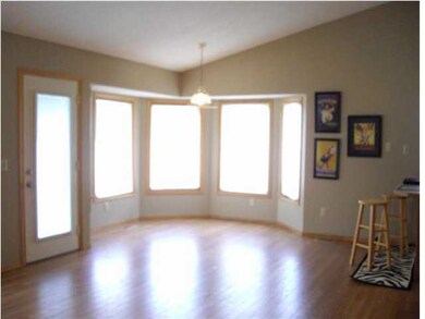 Sunny and bright. Large kitchen eating area made l