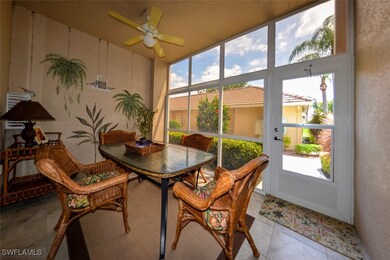 Sunroom featuring ceiling fan and a wealth of natu