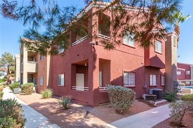 View of property with central AC unit