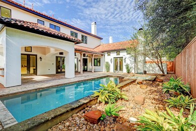 Backyard oasis with a sparkling POOL and spa, wate