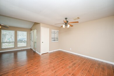 WALK INTO THE OPEN FLOOR PLAN WITH FLOORING AND DO