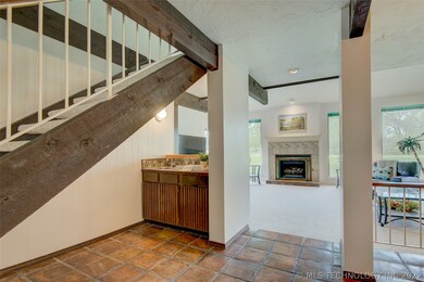 Straight ahead from the foyer is a wetbar and to t