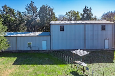 HUGE SHOP with 2 BR 1 BA Apartment upstairs.
