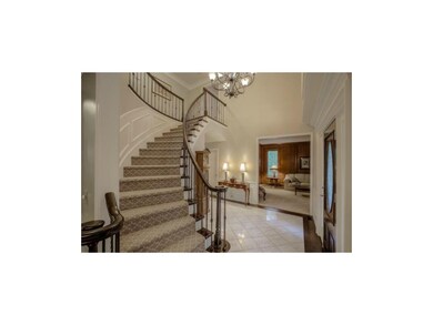 LIVING ROOM ADJACENT TO THE FOYER