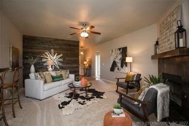 Living features charming wood plank accent wall.
