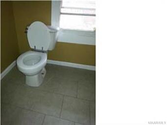 Half bath with new tile floors and other upgrades!