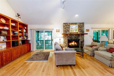 Great Room with Stone Fireplace and Built-Ins