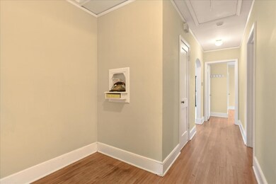 Hall featuring light hardwood / wood-style floors 