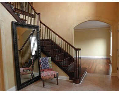 Entry/Foyer. Ceramic tile entry, iron railing ,tex