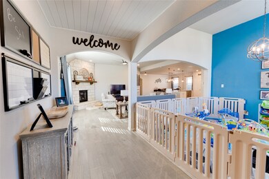 Front entrance with board and batten ceiling