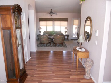 Front door entry w/gorgeous wood floor.