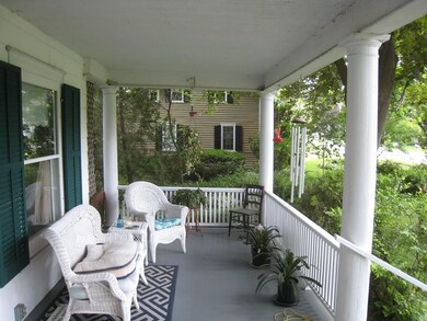 Front, covered sitting porch.
