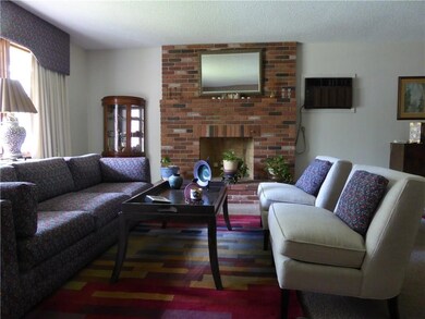 Living room with wood fireplace
